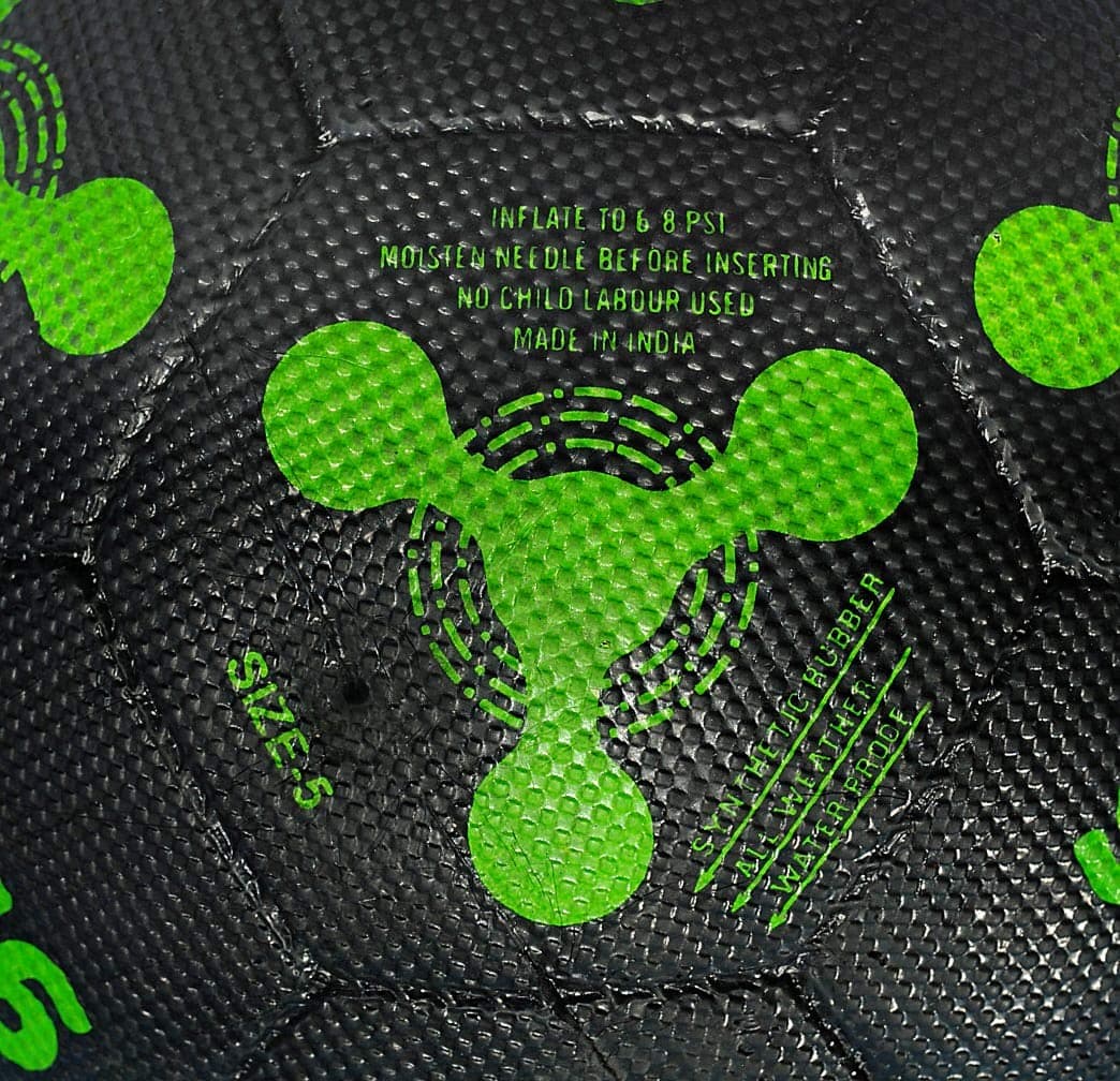 Close-up detail of the neon GR8 Leo football texture and print